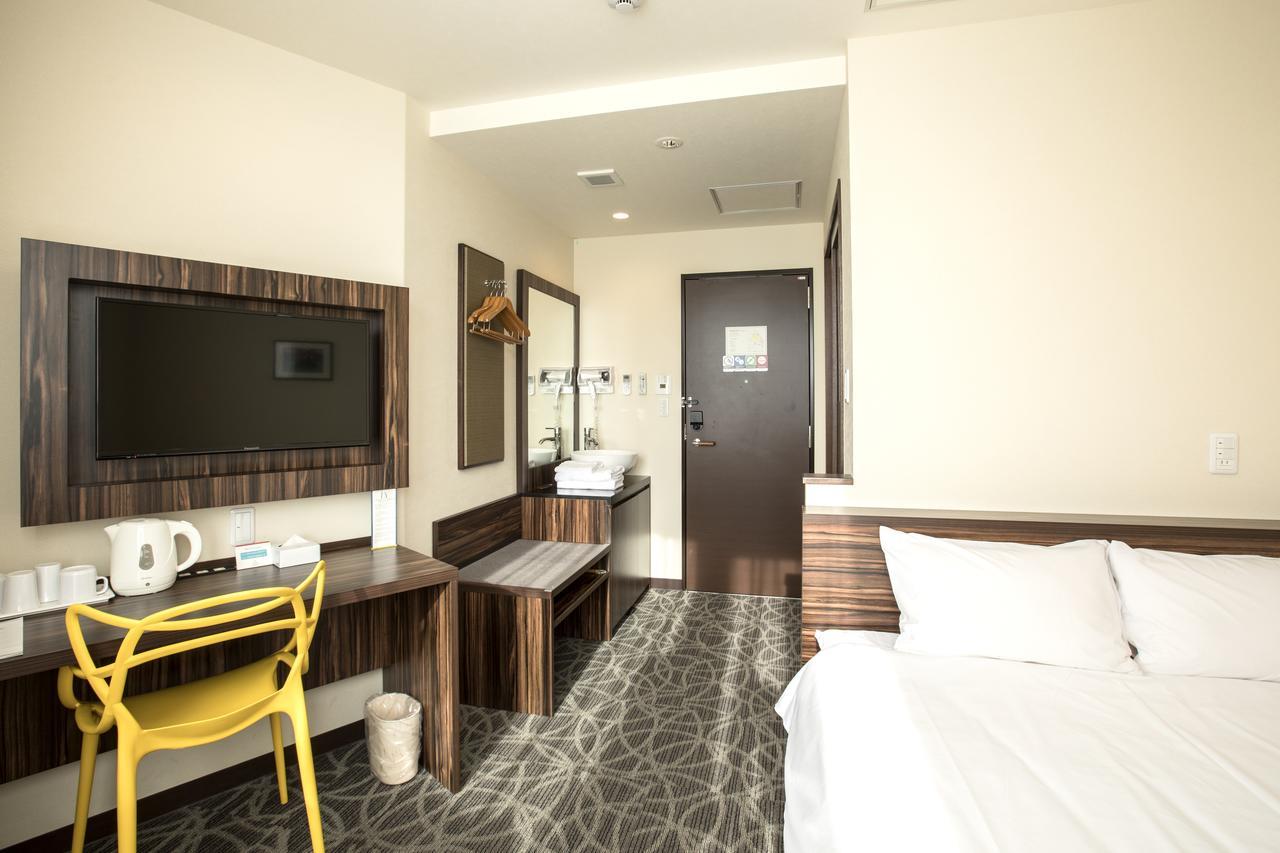 คะริยุชิ แอลซีเอช พรีเมียม Hotel นาฮะ ห้อง รูปภาพ